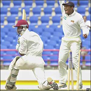 Marlon Samuels of the West Indies is stumped by Sri Lankan wicketkeeper Romesh Kaluwitharana for eight