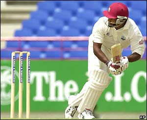 Brian Lara flicks a ball off his legs on his way to reaching another Test hundred