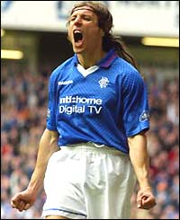 Claudio Caniggia yells in celebration after scoring against Kilmarnock