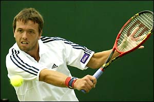 Child struggles early on and loses the first set 6-2