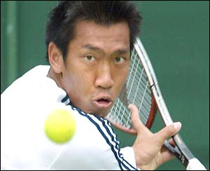 Paradorn Srichaphan focuses on the ball as he prepares a backhand