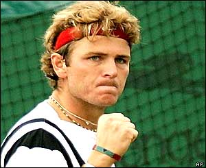 Mardy Fish punches the air after winning a point against Jan-Michael Gambill