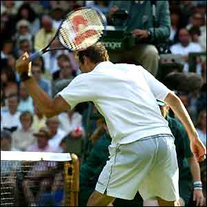 Greg Rusedski reacts furiously to a controversial line call