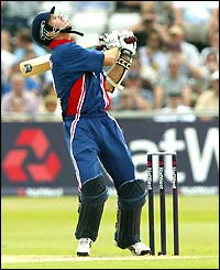 Michael Vaughan looks up to the skies after hitting a shot high in the air