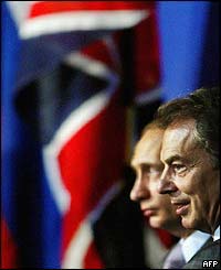 Tony Blair and Vladimir Putin at a Russian-UK Energy Summit in London