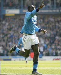 Foe celebrates scoring a goal for Manchester City
