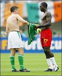 Ireland's Matt Holland swaps shirts with Foe after their World Cup 2002 group game