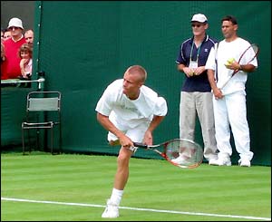 Lleyton Hewitt gets in some practice at Wimbledon on Monday