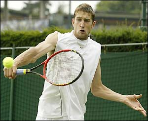Belgium's Max Mirnyi beats Lleyton Hewitt's conqueror, Ivo Karlovic