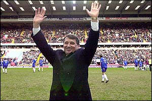 Graham Taylor waves to the fans on his return to management with Aston Villa