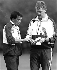 England manager Graham Taylor discusses tactics with assistant Lawrie McMenemy