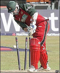 Zimbabwe's Andrew Hall is bowled for 82