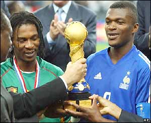 Marcel Desailly and Rigobert Song accept the Confederations Cup