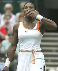 Serena Williams blows kisses to the crowd after her victory over Elena Demetieva
