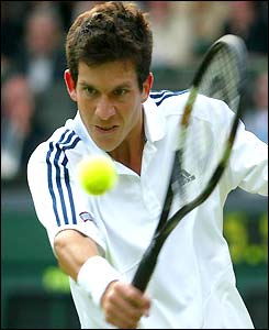 Tim Henman plays a backhand volley
