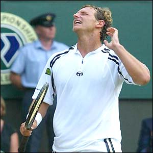 David Nalbandian looks frustrated after missing a shot