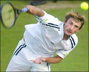 Juan Carlos Ferrero serves