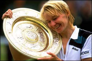 Jana Novotna celebrates victory