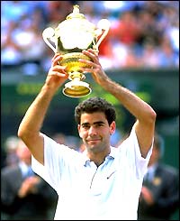 Pete Sampras lifts the Wimbledon trophy in 1997