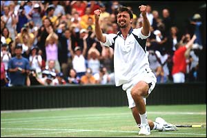 Goran Ivanisevic falls to his knees after claiming victory at Wimbledon in 2001