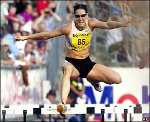 Australia's Jana Pittman wins the 400m women's hurdles