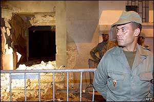 Policemen stand guard in front of the Casablanca Jewish cultural centre, the target of a suicide bomb, early 17 May 2003