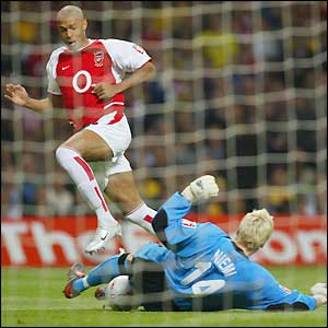 Thierry Henry's shot is saved by Antti Niemi