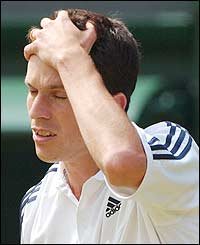 Henman shows his frustration as Grosjean secures the third set