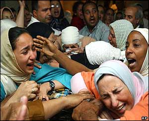 Mourners at the funeral of a Casablanca bomb victim