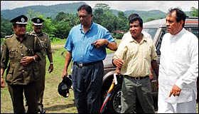 Ministers John Amaratunga and Karu Jayasooriya arrive in the flooding area in Ratnapura: Courtesy Sriyantha Walpola