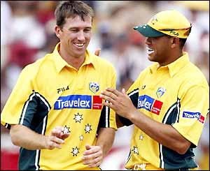 Glenn McGrath is congratulated by Andrew Symonds