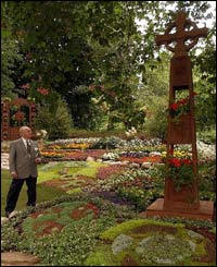 Historical consultant James Madden walks through the Lindisfarne Gospel Garden at the Chelsea Flower Show