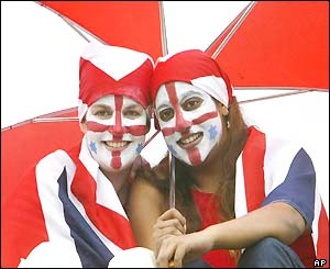 Henman fans with their faces painted with the cross of St George