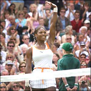 Serena Williams waves to the crowd after winning her semi-final