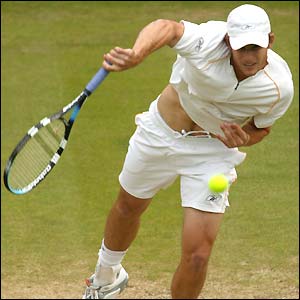 Andy Roddick serves