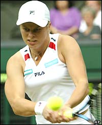 Kim Clijsters hits a double-handed backhand