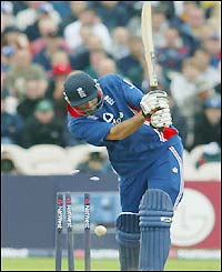 England's Richard Johnson is clean bowled after scoring only 10 off six balls