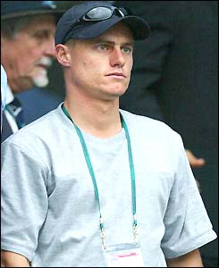Lleyton Hewitt watches from the crowd