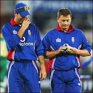 Michael Vaughan and Darren Gough are dejected after England's defeat