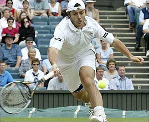 Sebastien Grosjean saves two set points against his serve in the 12th game 