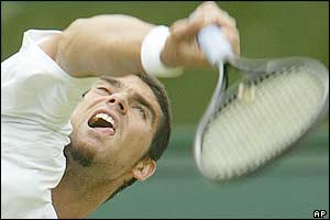 Mark Philippoussis serves to Grosjean 