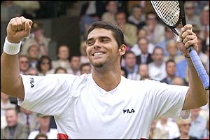 Mark Philippoussis celebrates after his win over Sebastien Grosjean