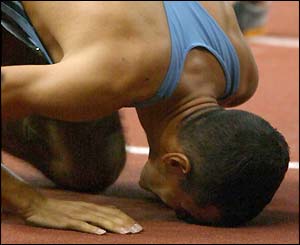 Mehdi Baala kisses the track after winning the 1500m