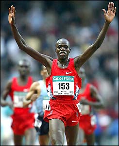 Abraham Chebii celebrates as he wins the 5000m