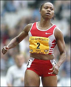 Chanda Sturrup crosses the line to win the 100m