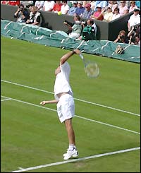 Greg Rusedski serves at Wimbledon