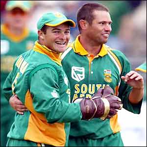 Mark Boucher celebrates with Andrew Hall