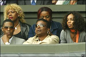 Members of the Williams family watch Venus play Serena in the final