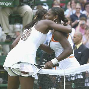 Venus Williams hugs her younger sister Serena after losing to her in the ladies' singles final