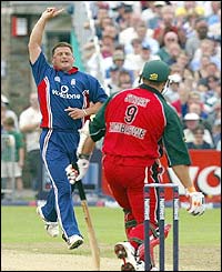 England's Darren Gough celebrates removing Dion Ebrahim